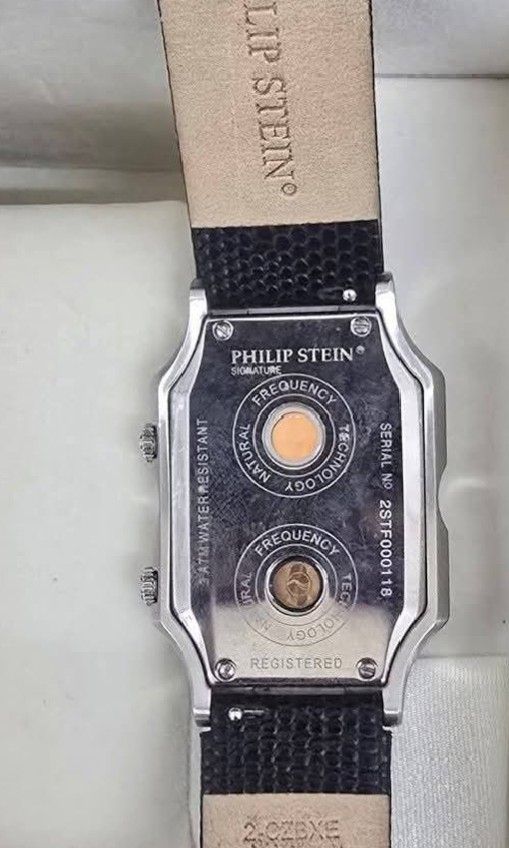 Philip Stein Signature Dual Time Zone (Category: Luxury Watches) located in Lapu Lapu. Submitted by povv-ph (Listing ID 1438117779, Image 3). Description: With Box and Receipt. +Signature "Eight-Shape" Case: Featuring a unique, curved stainless steel silhouette that contours elegantly to the wrist. +Dual Time Zone Dials: The watch face is uniquely divided into two independent subdials, allowing you to monitor two separate time zones simultaneousl