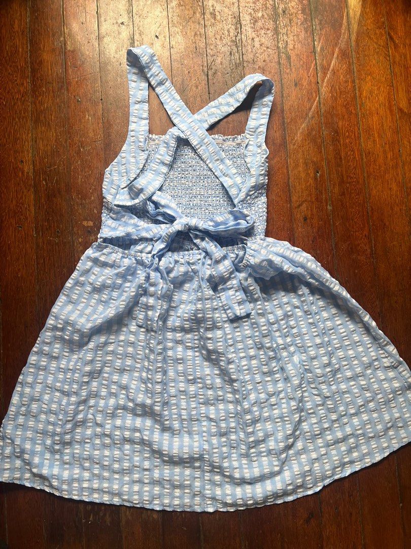 PLUS SIZE Shein 3XL Plaid Backless Dress (Category: Dresses) located in Mandaluyong City. Submitted by kkairi (Listing ID 1438240841, Image 2). Description: - Size: 3XL - Pattern: Blue and white plaid - Features: Smocked bodice, criss-cross back straps, bow detail - Perfect for casual and beach wear :).