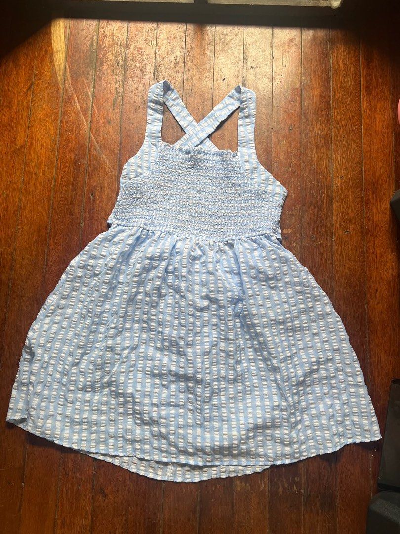 PLUS SIZE Shein 3XL Plaid Backless Dress (Category: Dresses) located in Mandaluyong City. Submitted by kkairi (Listing ID 1438240841, Image 1). Description: - Size: 3XL - Pattern: Blue and white plaid - Features: Smocked bodice, criss-cross back straps, bow detail - Perfect for casual and beach wear :).
