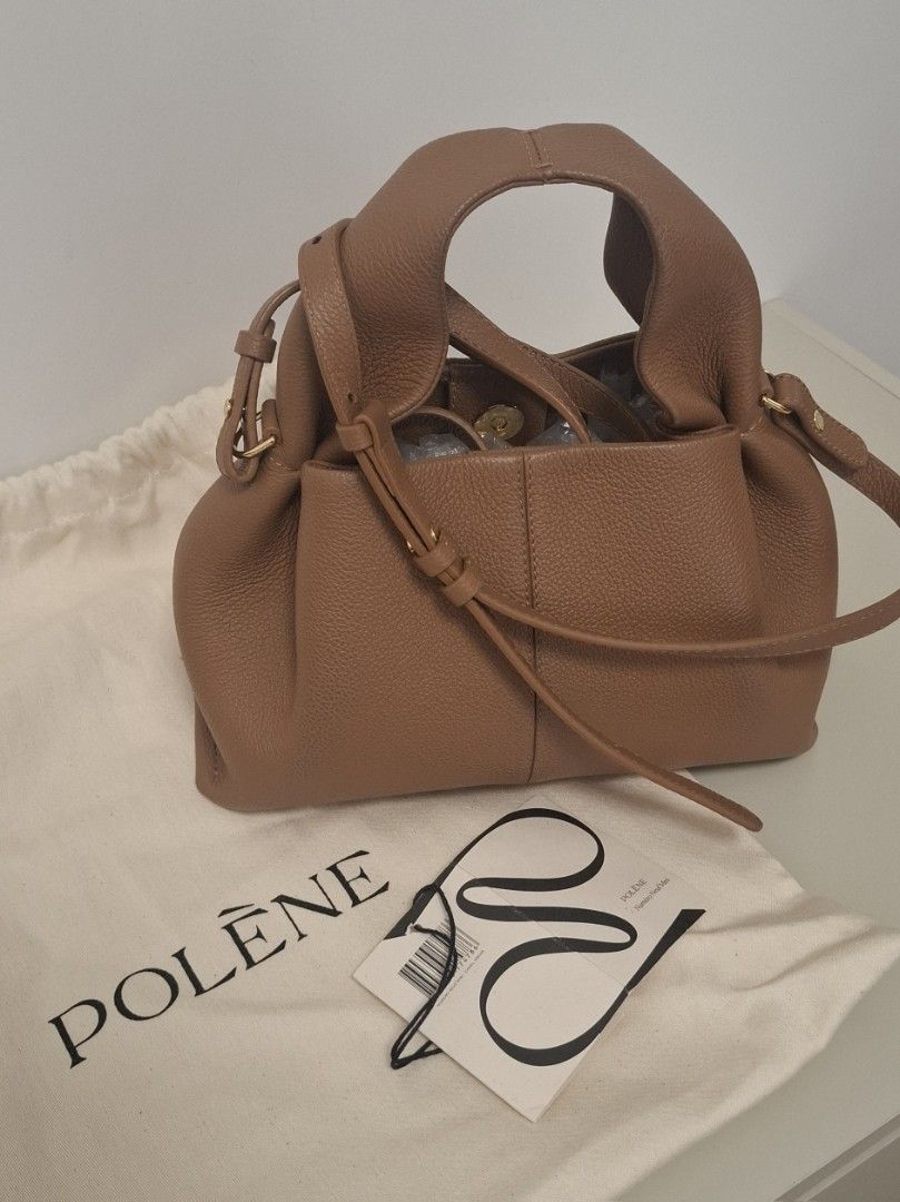 Polene | Numero Neuf Mini (Camel) (Category: Luxury Bags & Wallets) located in Binan City. Submitted by iamstefhhhhh (Listing ID 1438195110, Image 1). Description: WTS LFB PH Original Price: P34,000+ Selling Price: P25,000 (Last price) Polene Numero Neuf Mini Camel Bought in Tokyo last January 2026 Used a few times. With signs of use. Scuffing on the edges. Small spot on the interior lining. Comes with the box and dustbag. Can't find the receipt.