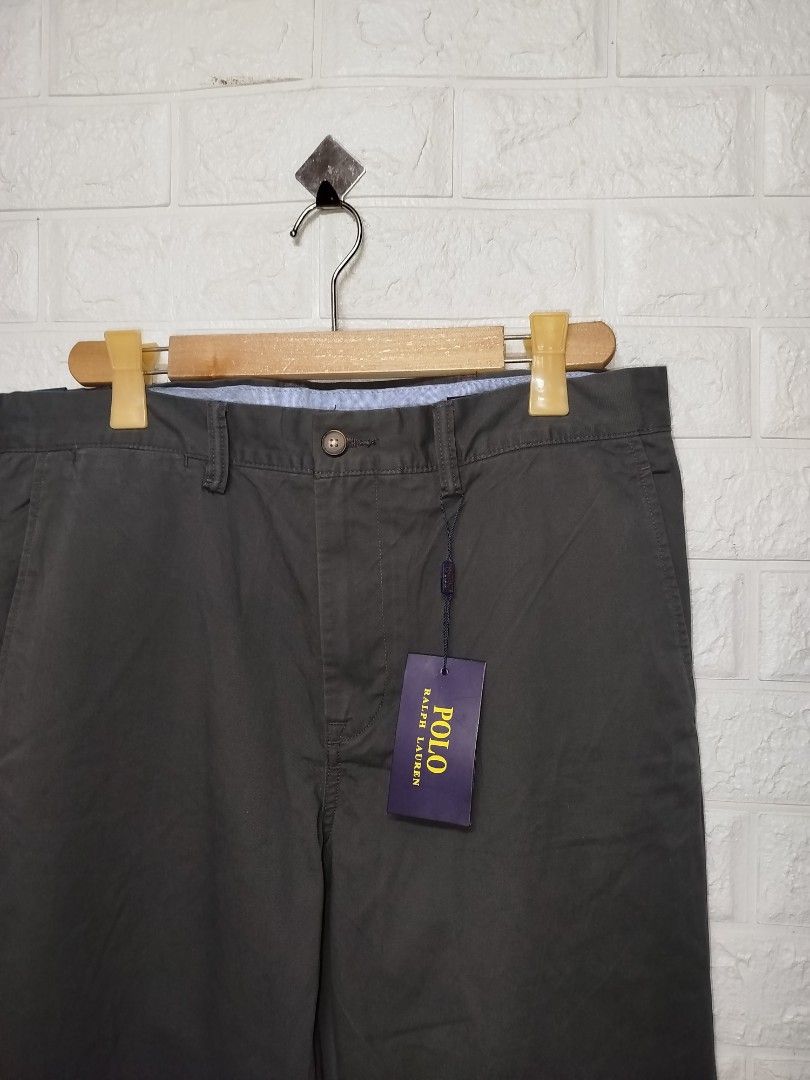 Polo Ralph Lauren Chino Pants (Category: Chinos) located in Taguig. Submitted by giango1313 (Listing ID 1438197820, Image 2). Description: - Polo Ralph Lauren chino pants - Dark grey color - Straight leg fit - Button closure - Brand new with original tag - Ideal for smart casual wear.