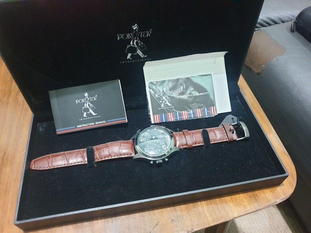 Porter International Chronograph Watch (Category: Men's Watches) located in Dasmarinas. Submitted by mysticfalcon.b6bfec (Listing ID 1438124410, Image 1). Description: - Porter International watch - Brown leather strap - Black dial with chronograph subdials - Includes original box, instruction manual, and warranty card - Stainless steel back with Porter International logo - Water-resistant original price: 20k in peso.