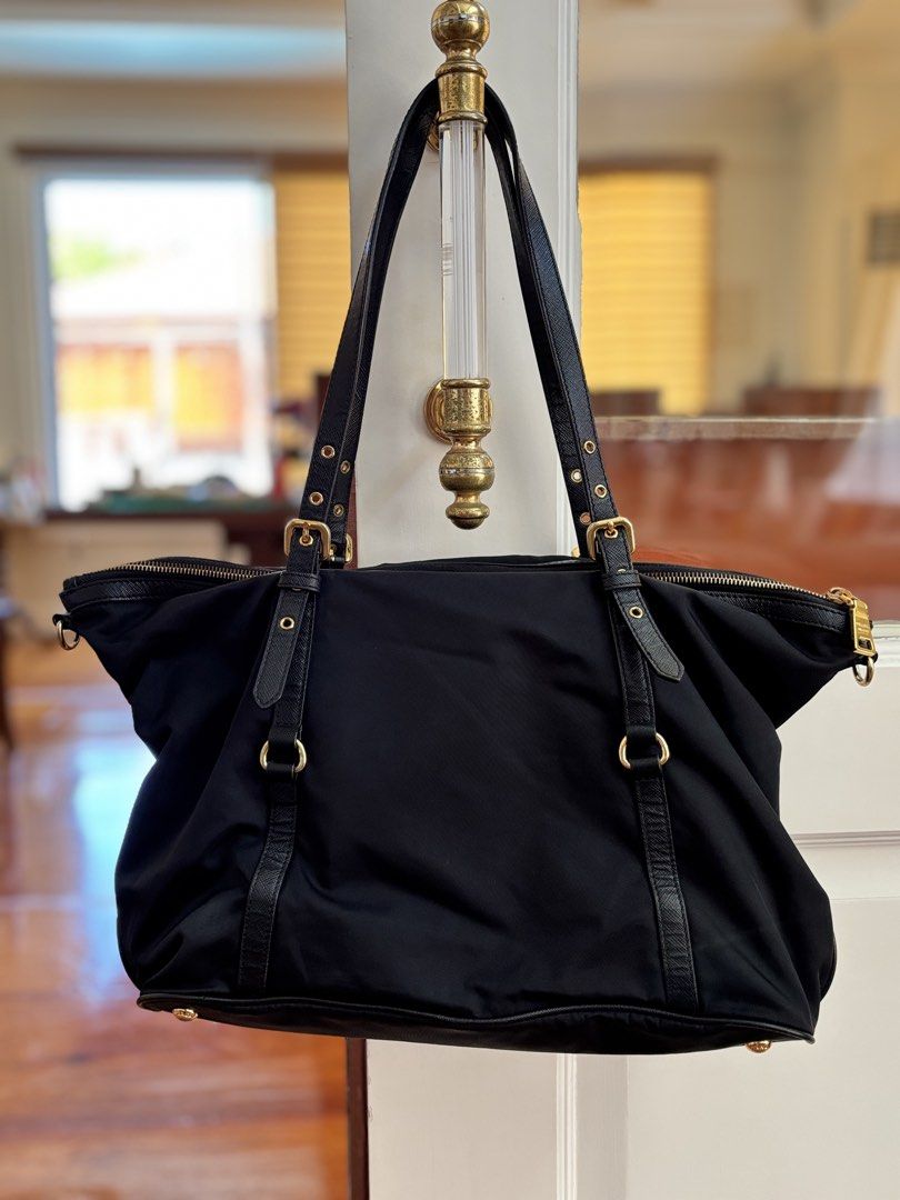 Prada Tessuto Nylon Zipped Tote (Category: Luxury Bags & Wallets) located in Muntinlupa City. Submitted by closet.confessions (Listing ID 1438158638, Image 2). Description: the crowd’s favorite 🖤 PRADA Tessuto Nylon Zipped Tote Rank A comes with hangtag, detachable long strap & provided dustbag 💰 30k ONLY!!! ♣️ *vs other seller’s: 38k up!!!.