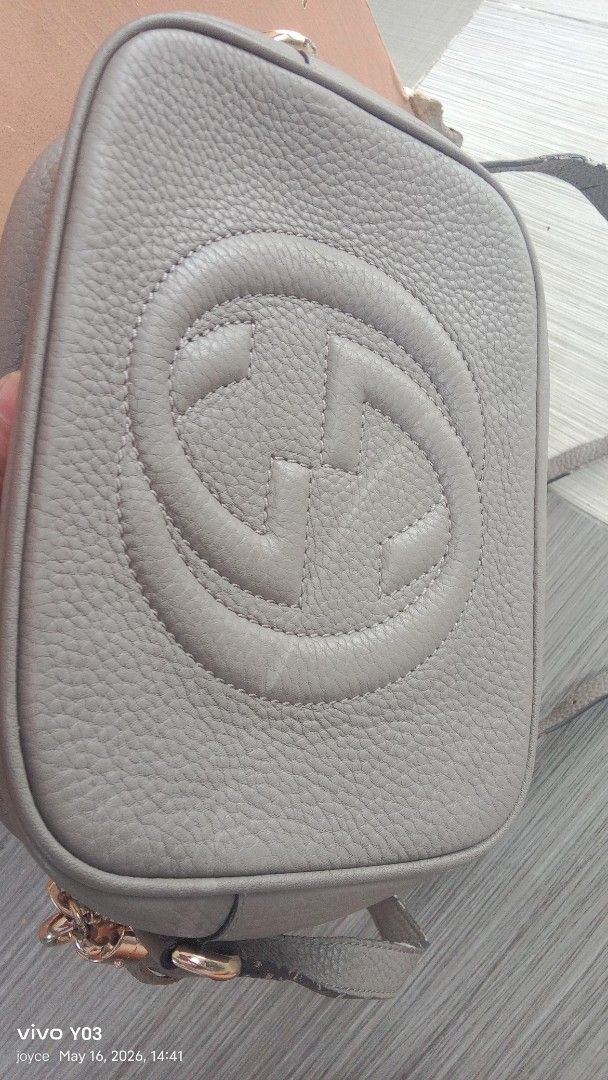 Preloved Gucci Soho Disco Bag (Category: Luxury Bags & Wallets) located in Cabuyao City. Submitted by selections888 (Listing ID 1438172628, Image 3). Description: - preloved Gucci Soho Disco Bag - Color: Gray - Features the iconic interlocking GG logo - Round shape - Long shoulder strap - Tassel zipper pull - Zipper closure - Material: Leather -with signs of use see detailed pics..need bag spa -for sale as is.
