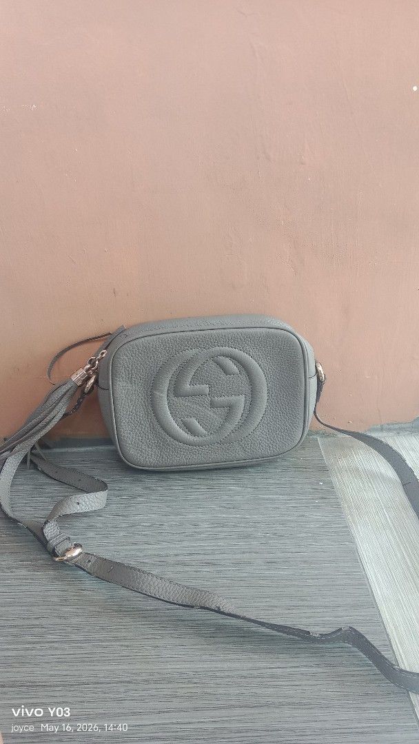 Preloved Gucci Soho Disco Bag (Category: Luxury Bags & Wallets) located in Cabuyao City. Submitted by selections888 (Listing ID 1438172628, Image 2). Description: - preloved Gucci Soho Disco Bag - Color: Gray - Features the iconic interlocking GG logo - Round shape - Long shoulder strap - Tassel zipper pull - Zipper closure - Material: Leather -with signs of use see detailed pics..need bag spa -for sale as is.