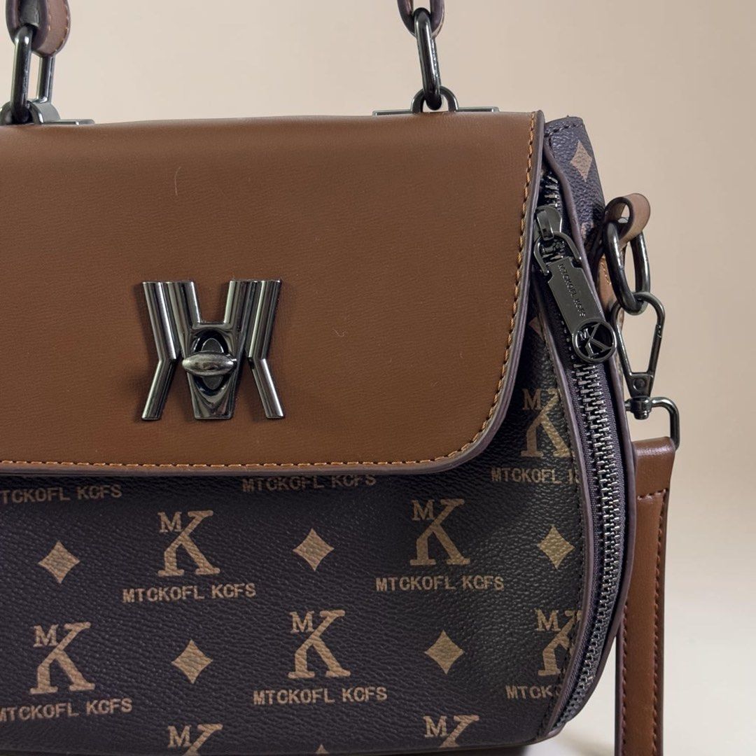 Premium bags from Singapore (Category: Cross-body Bags) located in Batangas. Submitted by jadoreco16 (Listing ID 1438198907, Image 1). Description: Handbag Crossbody No issue Like new Shipping via j&t.