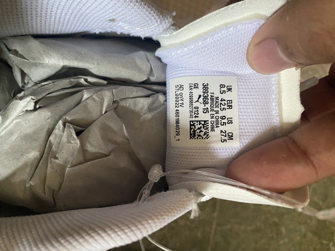 Puma Caven White Green Sneakers (Category: Sneakers) located in Manila. Submitted by kuyamarkthrift (Listing ID 1438218587, Image 3). Description: - Puma Caven sneakers - White upper with green accents - Green sole with Puma logo - Size: US 9, UK 8.5, EUR 42, 27 CM - Brand new in original box.
