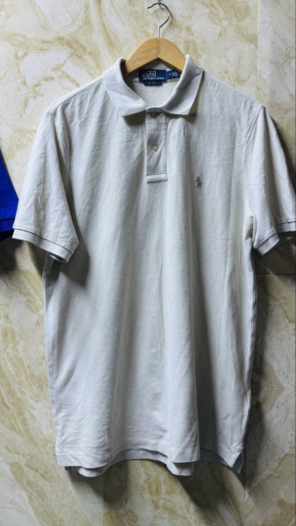Ralph Lauren RL Origin Polo Shirt (Category: Tshirts & Polo Shirts ) located in Batangas. Submitted by cjayf (Listing ID 1438214199, Image 2). Description: - Authentic Ralph Lauren RL Origin Polo Shirt - Size: M - Classic Fit - Color: Light Cream - Features the iconic polo logo - Made with cotton sourced from India - A timeless wardrobe staple.