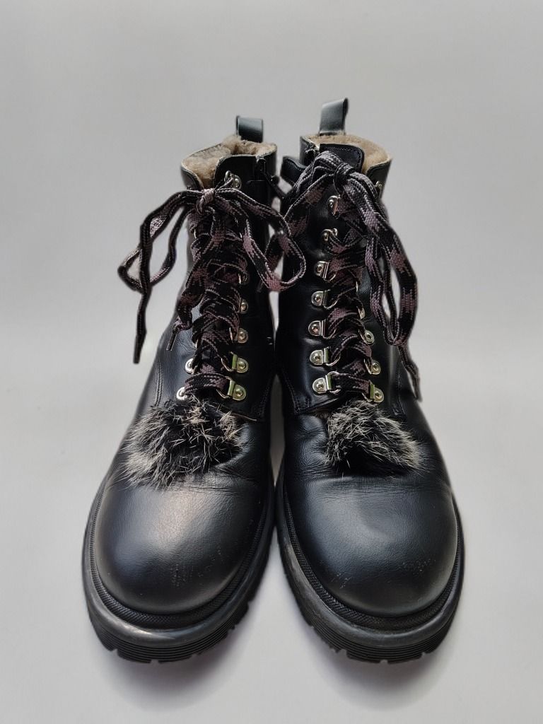 Rebecca Minkoff Black Leather Jaylin Combat Boots (Category: Boots) located in Caloocan City. Submitted by reloveebyellie (Listing ID 1438165401, Image 2). Description: - Rebecca Minkoff black leather combat boots - Textured rubber traction outsole - Fur accents - Velvet ribbon laces - Side zipper - Fur lining - No box.