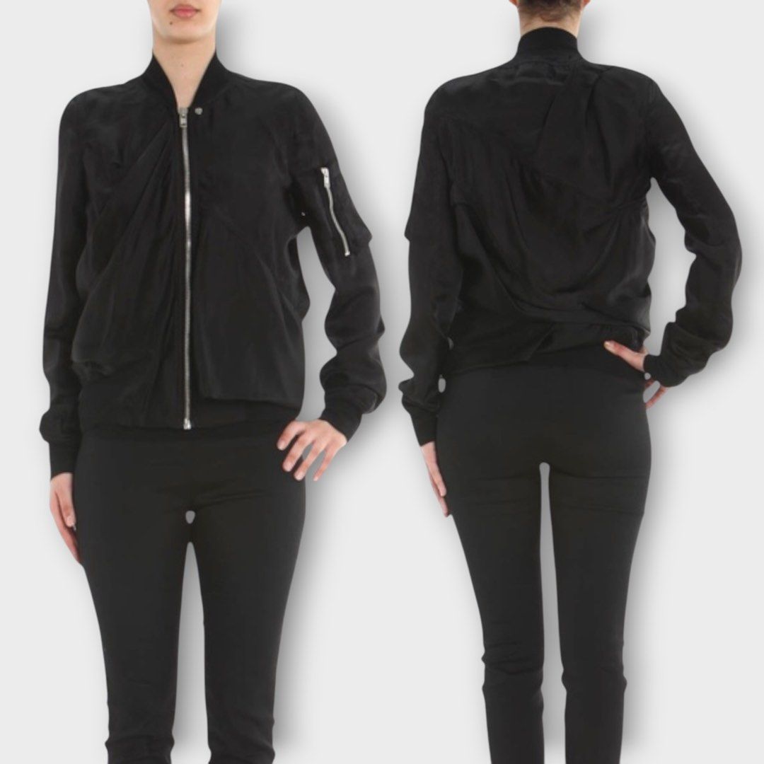 Rick Owens S/S16 - Cyclops - Zipped Ripple Flight Jacket (Category: Coats, Jackets and Outerwear) located in Los Banos. Submitted by declutterking (Listing ID 1438285237, Image 1). Description: Size 36 on tag Long sleeved viscose bomber jacket detailed with stand up collar, zipped arm pocket, asymmetric stitchings to form drapes and rib knitted collar and waistline. Front zip fastening. Fully lined. It is part of Cyclops S/S 16 collection. Slashe