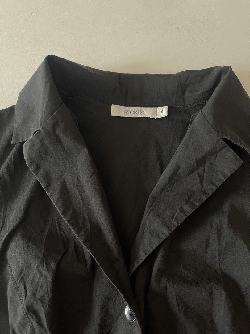 Rickis Black Sleeveless Blouse Size 4 (Category: Blouses) located in Manila. Submitted by shop.ligaya (Listing ID 1438273172, Image 2). Description: - Rickis black sleeveless blouse - Collared neckline - Button-down front - Fitted silhouette - Lightweight fabric - Suitable for warmer weather - Versatile style Size: Small.