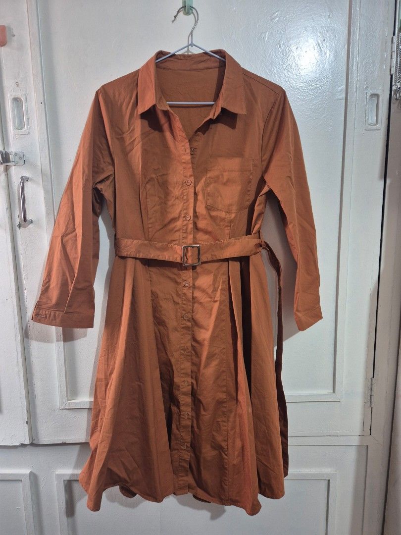 Rust Orange Dress with Belt (Category: Dresses) located in Quezon City. Submitted by conchicken (Listing ID 1438171025, Image 1). Description: - Orange dress - Matching belt with silver buckle - Collared neckline - Long sleeves - Button-down front - Tailored fit - Suitable for casual and semi-formal occasions - up to 38 bust line -, medium to large -premium quality.