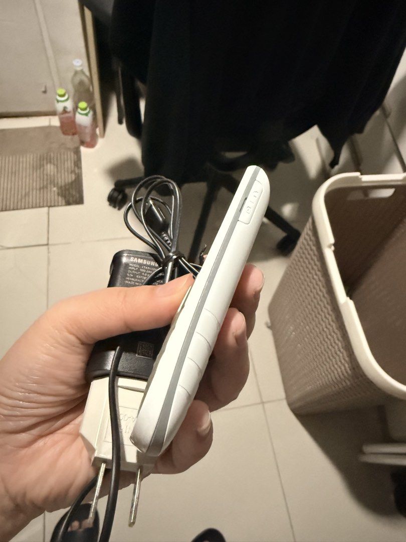 Samsung Basic Phone with Charger (Category: Samsung) located in Taguig. Submitted by weee1994 (Listing ID 1438229966, Image 2). Description: - Samsung basic phone - White color - Keypad included - Charger included - Good working condition - Ideal for basic communication.