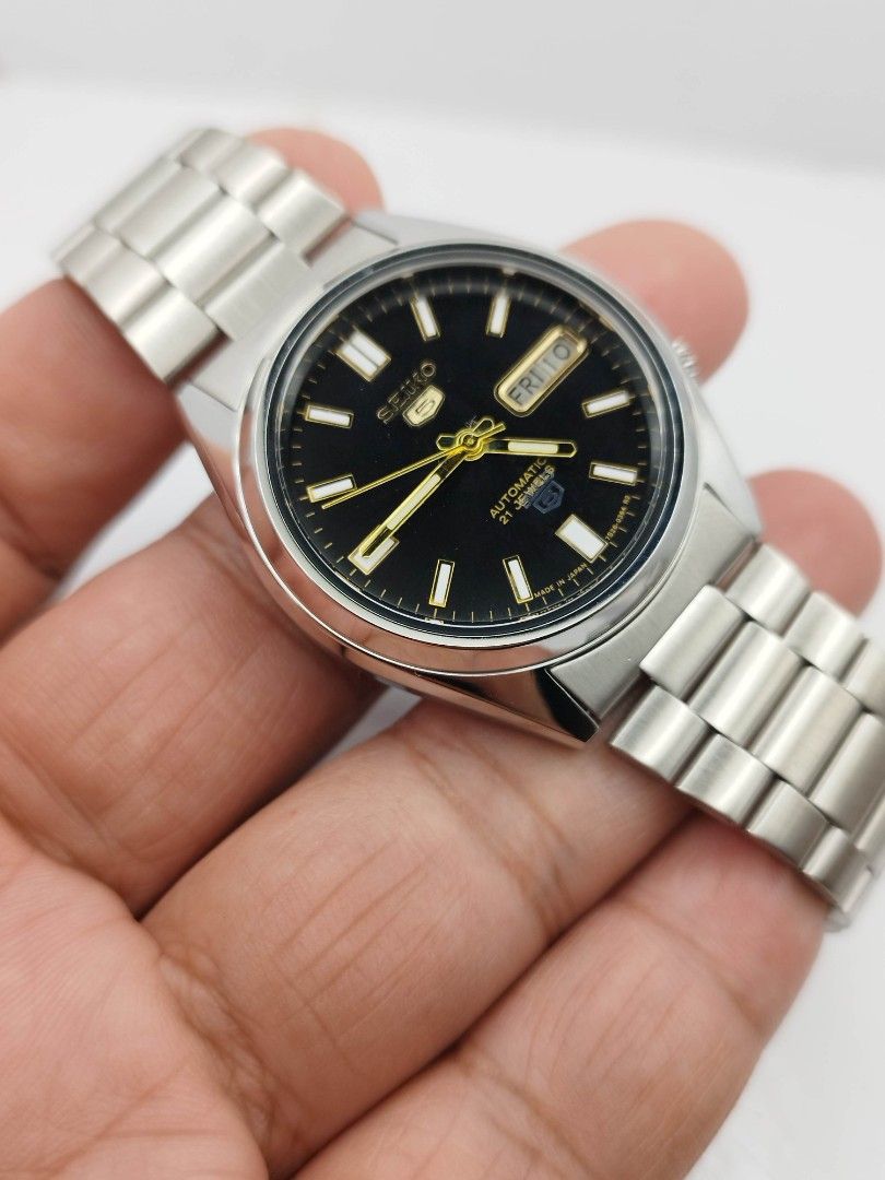 Seiko 5 black dial (Category: Men's Watches) located in Quezon City. Submitted by WatchProject (Listing ID 1438277095, Image 3). Description: original Seiko 7009 movement 37mm case dm Newly overhauled and oiled movement I'n good running condition with box manual and paper bag stainless steel aftermarket base dial hands and strap.
