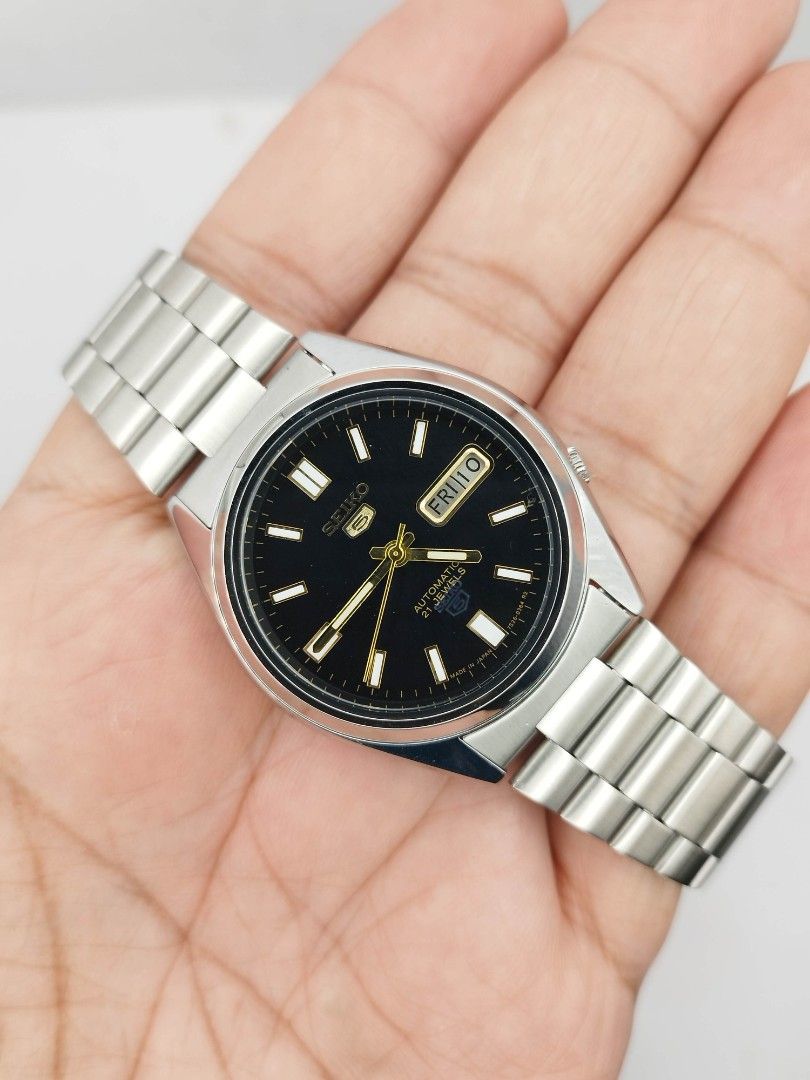 Seiko 5 black dial (Category: Men's Watches) located in Quezon City. Submitted by WatchProject (Listing ID 1438277095, Image 1). Description: original Seiko 7009 movement 37mm case dm Newly overhauled and oiled movement I'n good running condition with box manual and paper bag stainless steel aftermarket base dial hands and strap.