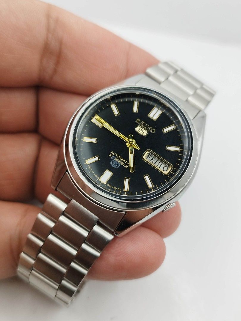 Seiko 5 black dial (Category: Men's Watches) located in Quezon City. Submitted by WatchProject (Listing ID 1438277095, Image 2). Description: original Seiko 7009 movement 37mm case dm Newly overhauled and oiled movement I'n good running condition with box manual and paper bag stainless steel aftermarket base dial hands and strap.