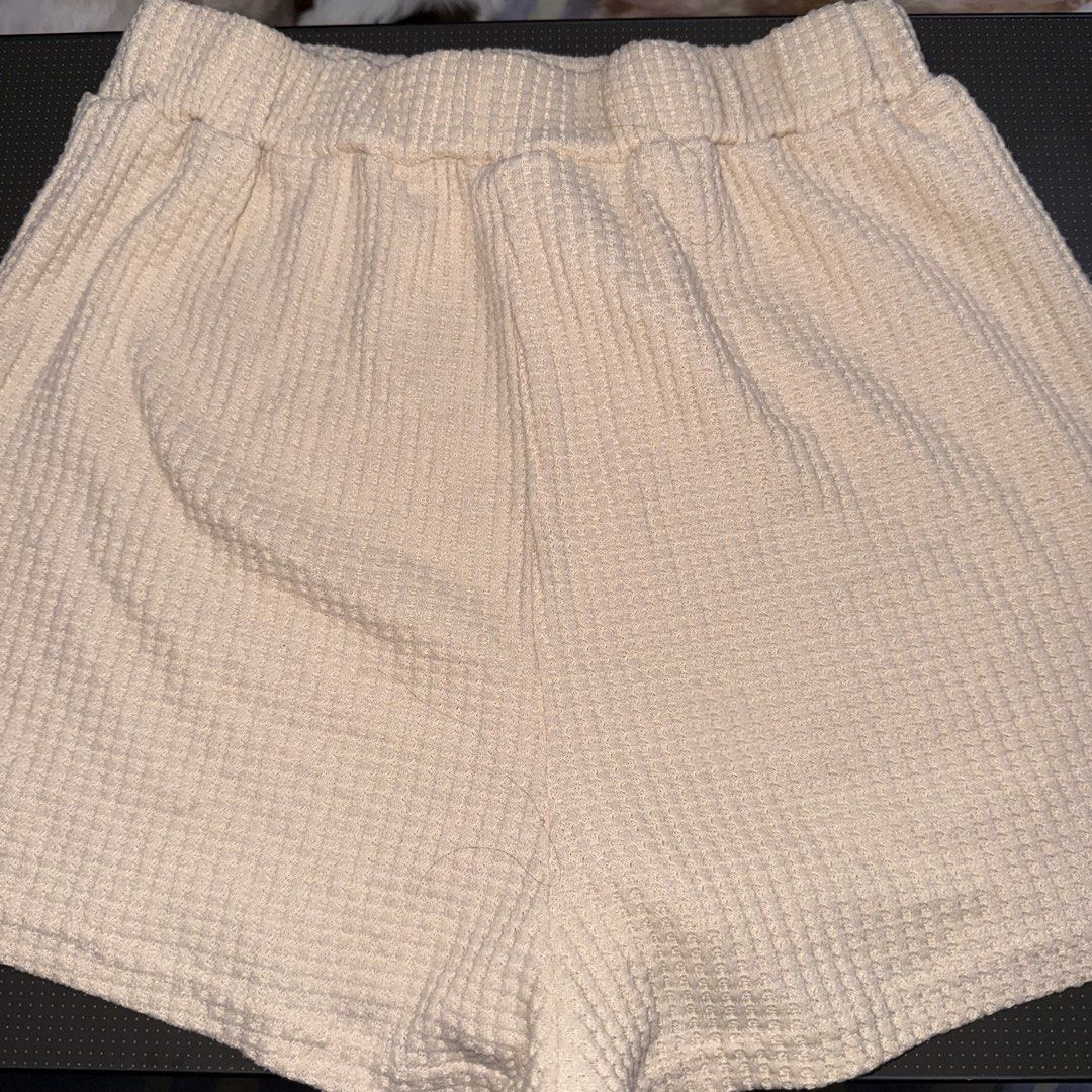 Shein Waffle Shorts (beach short) (Category: Shorts) located in Quezon City. Submitted by sabbyfinds (Listing ID 1438272101, Image 3). Description: 🔍 Manage Expectations All items are thrifted/own preloved. Expect minimal signs of use. ALL POSTED PICTURES ARE TRUE TO ITS COLOR AND FLAWS - Size: XS ; L-13 in w:11-15 in Thigh hole : 11.5 in - Waffle knit texture - Elastic waistband - Material: 97% polyester, 3% elastane - Casual wear/ beach wear -