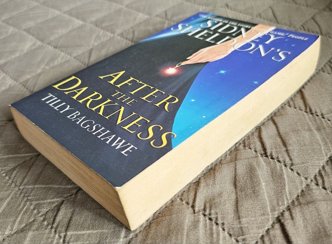 Sidney Sheldon's After the Darkness by Tilly Bagshawe (Category: Storybooks) located in Quezon City. Submitted by the_l1ttlej0ys (Listing ID 1438164928, Image 3). Description: preowned with light storage marks > external edges may be a bit browner than pictured due to lighting in very good condition no writings or creases (only one crease as shown in pic).