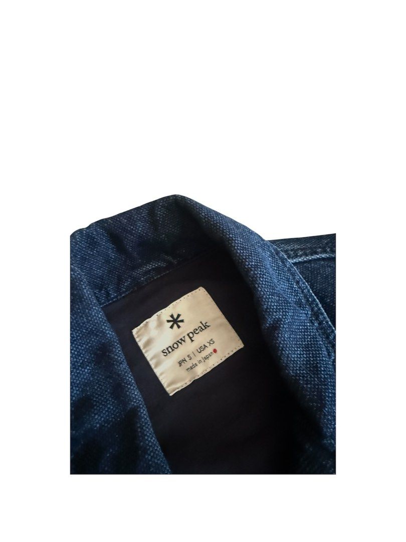 Snow Peak indigo denim okayama ox work jacket (Category: Coats, Jackets and Outerwear) located in San Juan City. Submitted by declutteredliving (Listing ID 1438211128, Image 2). Description: - Size: XS (USA); S (JPN) - Width 20 - Sleeves 24 - Length (from shoulders) 27 - Bought this in Japan - Features multiple front pockets - Small logo patch on chest pocket - Made in Japan .