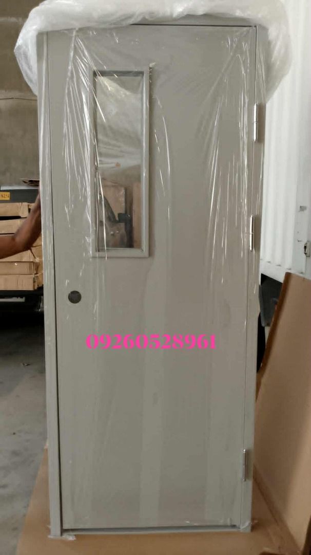 steel door with glass (Category: Locks, Doors & Gates) located in Caloocan City. Submitted by vttsteeldoor-chelle (Listing ID 1438141112, Image 1). Description: VTT Steel Door With viewing Glass Sizes : 80x210cm 90x210cm 100x210cm with jamb and doorknob Powder coated gray finish with honeycomb insulation 2 hrs fire rated Made of BlACK Iron Steel. readily available.