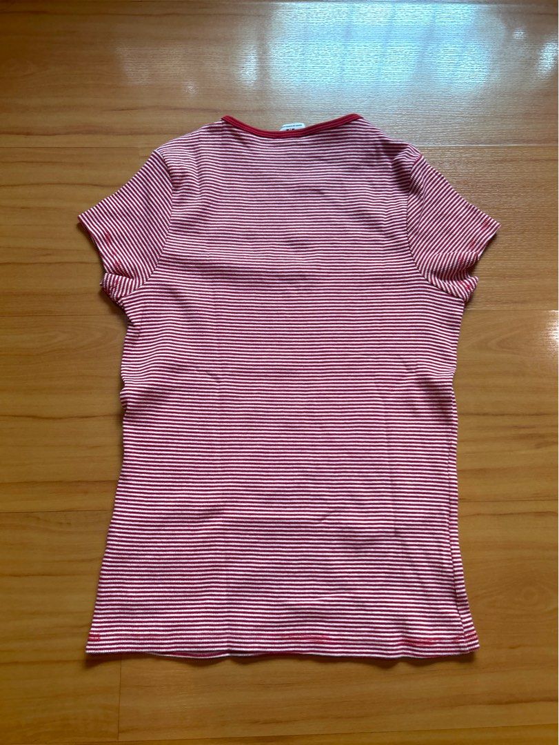 Striped Red and White T-shirt (Category: Shirts) located in San Juan City. Submitted by porygon (Listing ID 1438164707, Image 2). Description: - Classic red and white striped design - Comfortable, soft material - Features a round neckline - Short sleeves - Versatile for casual outfits - Worn once or twice, good as new - Price negotiable for sure buyer! Ps. The red lines at the bottom are its hem stitches. It is not noticeable in real life :) #y2k