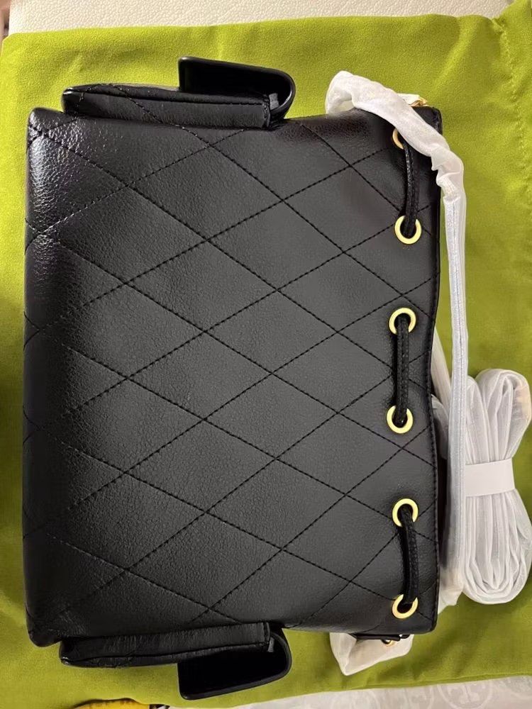 Tory Burch Charlie Quilted Drawstring Shoulder Bag (Category: Luxury Bags & Wallets) located in Paranaque City. Submitted by b4gaddict (Listing ID 1438197743, Image 2). Description: - Brand new black quilted handbag - Elegant gold-tone hardware - Secure drawstring closure - Versatile detachable shoulder strap - Interior zip pocket for valuables - Convenient side flap pocket - Includes brand label - Still has original tags attached Brand new with 