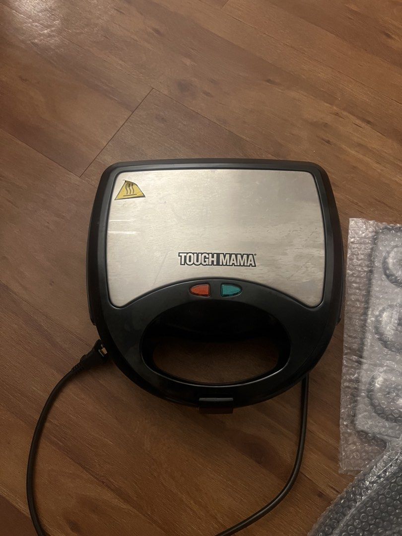 Tough Mama Multi-Function Waffle Maker (Category: Other Kitchen Appliances) located in Quezon City. Submitted by shopclosetttt (Listing ID 1438256266, Image 3). Description: Used twice. Good as new. - Multi-function waffle maker with 4 interchangeable plates - Non-stick surface for easy cooking and cleaning. - Features indicator lights for operation SRP 1,700+ Selling for 1,299.