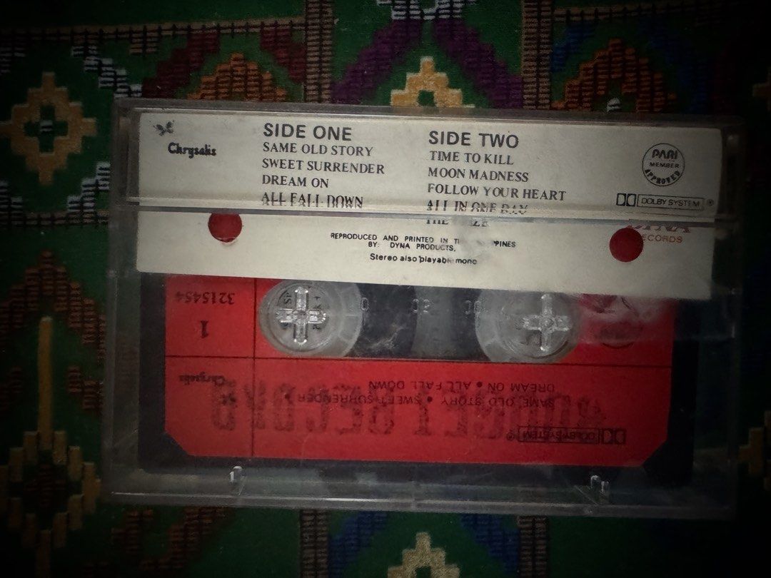Ultravox - Ultravox Cassette Tape (Category: CDs & DVDs) located in San Juan City. Submitted by redgecollection (Listing ID 1438197203, Image 2). Description: FREE FOR EVERY PURCHASE OF 2 TAPES - Original Ultravox cassette tape. - Tracks include: 'Same Old Story', 'Sweet Surrender', 'Dream On', 'All Fall Down', 'Time To Kill', 'Moon Madness', 'Follow Your Heart', and 'All In One Day'. - Produced and printed in the Philippines by Dyna Products. - 