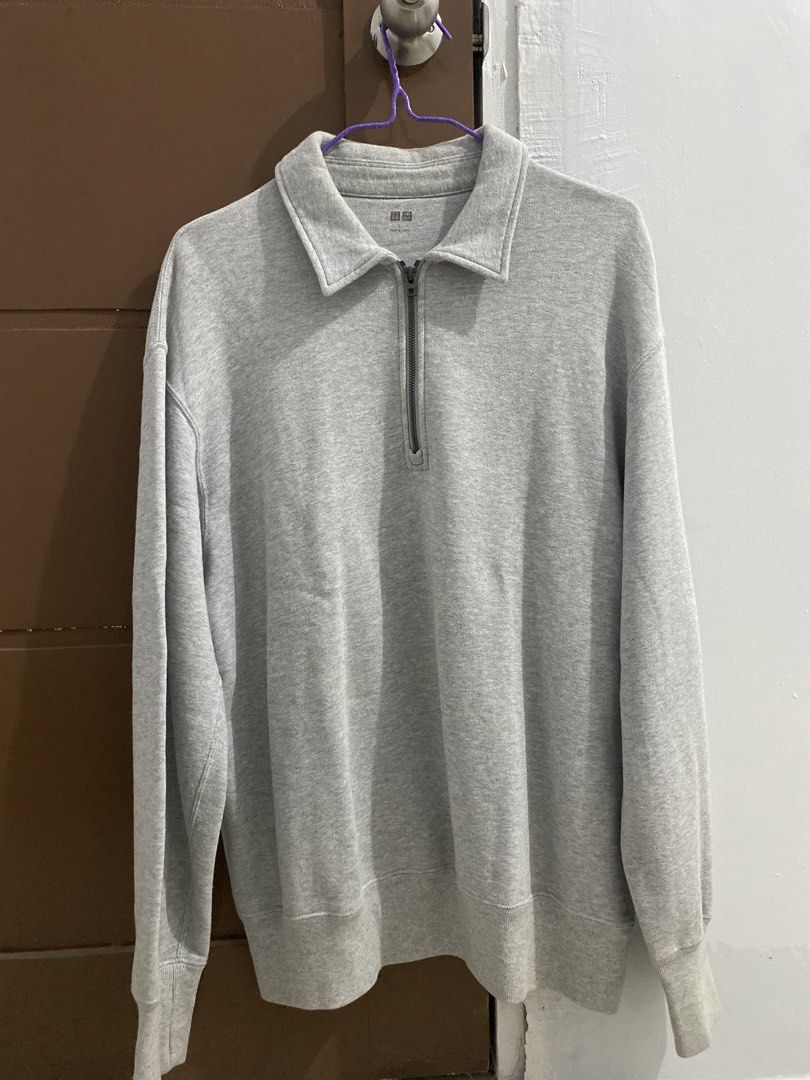 Uniqlo Grey Halfzip Sweater (Category: Coats, Jackets and Outerwear) located in Manila. Submitted by dropndrip (Listing ID 1438267381, Image 1). Description: -10/10 condition -need wash -Large to XL size -good as new.