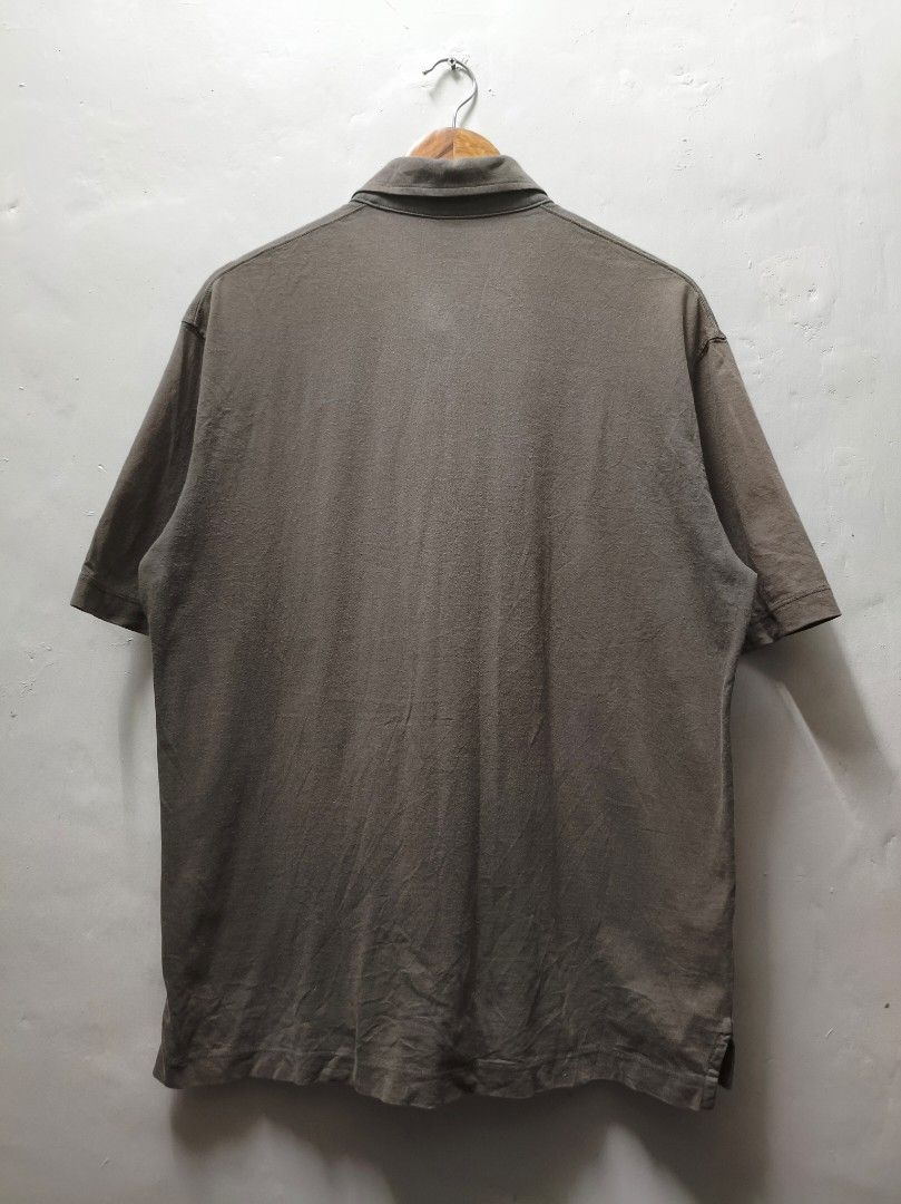 Uniqlo Moss Green Polo (Category: Tshirts & Polo Shirts ) located in Mandaluyong City. Submitted by frivsthriftsph (Listing ID 1438210273, Image 2). Description: Uniqlo Moss Green Polo Lightly used condition. Color rate is 8.5/10. Size L on tag. Actual dimes are 22W by 28L. No issue..