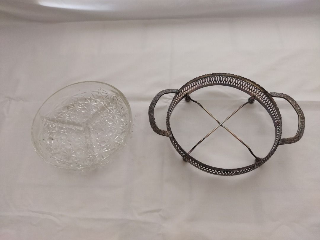Vintage Crystal Serving Dish with Metal Stand (Category: Dinnerware & Cutlery) located in Paranaque City. Submitted by 8prelovedthings8 (Listing ID 1438215747, Image 1). Description: - Vintage serving dish - Clear crystal bowl with three sections - Decorative metal stand with handles - Perfect for snacks, candies, or appetizers - Features a beautiful starburst pattern - Adds charm to any table setting.