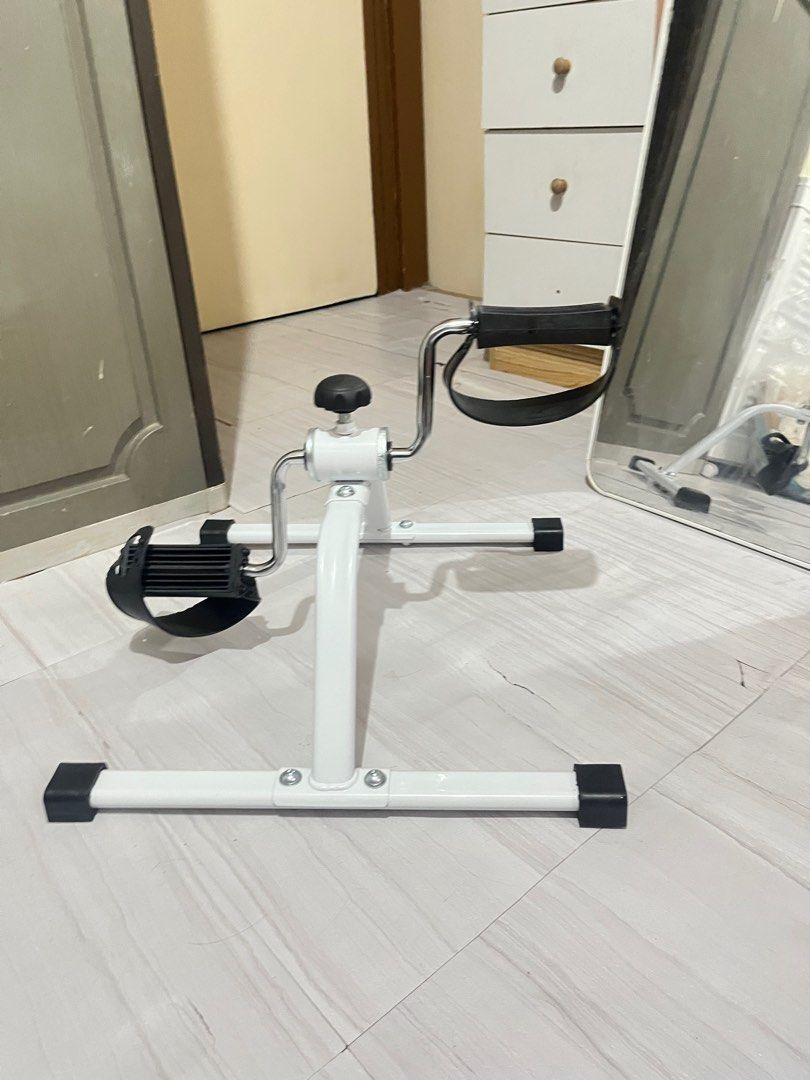 White Exercise Pedal for elderly or adult (Category: Cardio & Fitness Machines) located in Paranaque City. Submitted by prelovedbypachi (Listing ID 1438186042, Image 2). Description: - White exercise pedal - Adjustable resistance - For arm and leg exercises - Sturdy base with rubber feet - Easy to store and use - Suitable for home workouts.