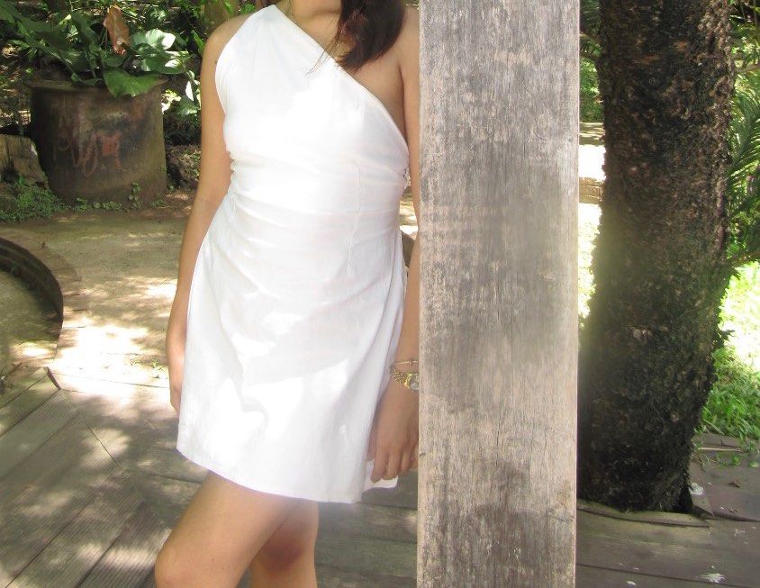 White One-Shoulder Backless Short Dress (Category: Sleeveless) located in Davao. Submitted by _manuella (Listing ID 1438153688, Image 1). Description: - Elegant white one-shoulder dress - Fitted design - Perfect for a night out or special occasion - Versatile piece, can be dressed up or down.