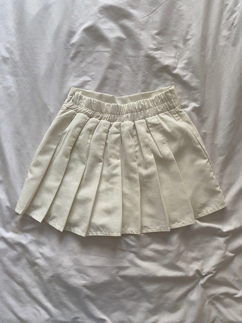 White Tennis Skirt / Skort (Category: Skirts) located in Quezon City. Submitted by ashleyken (Listing ID 1438172617, Image 2). Description: garter back, has shorts inside! Length: 13.5” (mini skirt length).
