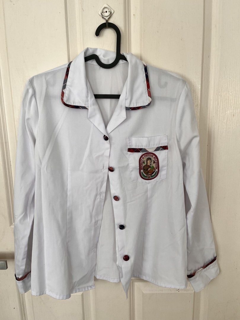 White Uniform Shirt - Size M (Category: Shirts) located in Bacoor. Submitted by clothestodeclutter (Listing ID 1438144510, Image 2). Description: - White uniform shirt - Size: M - Collared neckline - Plaid trim on collar and sleeves (red, white, and blue).