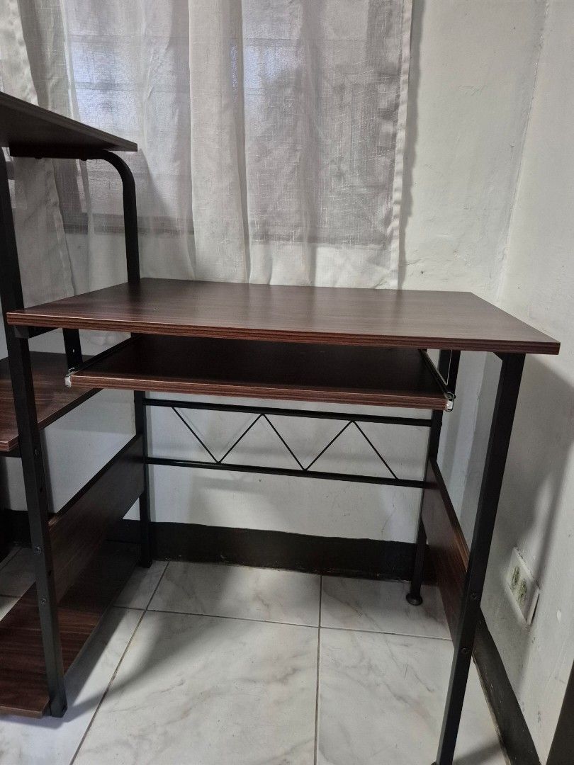 Computer Table (Category: Tables & Sets) located in Angono. Submitted by rze1950 (Listing ID 1438301758, Image 2). Description: Brand: San-Yang Computer Table - Has two levels of shelves (good for putting printer on the side) - With pull-out keyboard tray RFS: No longer needed Location: Angono, Rizal Mode of Payment: Gcash/BPI Mode of Delivery: Lalamove.