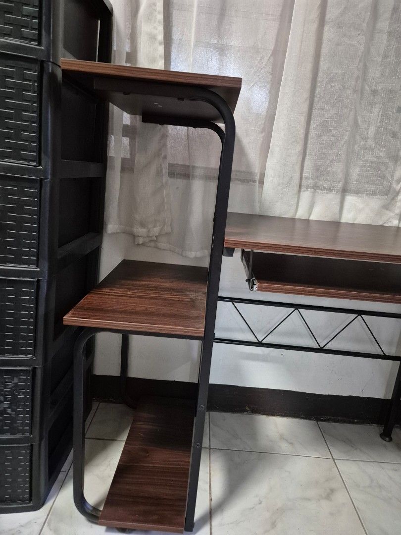 Computer Table (Category: Tables & Sets) located in Angono. Submitted by rze1950 (Listing ID 1438301758, Image 3). Description: Brand: San-Yang Computer Table - Has two levels of shelves (good for putting printer on the side) - With pull-out keyboard tray RFS: No longer needed Location: Angono, Rizal Mode of Payment: Gcash/BPI Mode of Delivery: Lalamove.