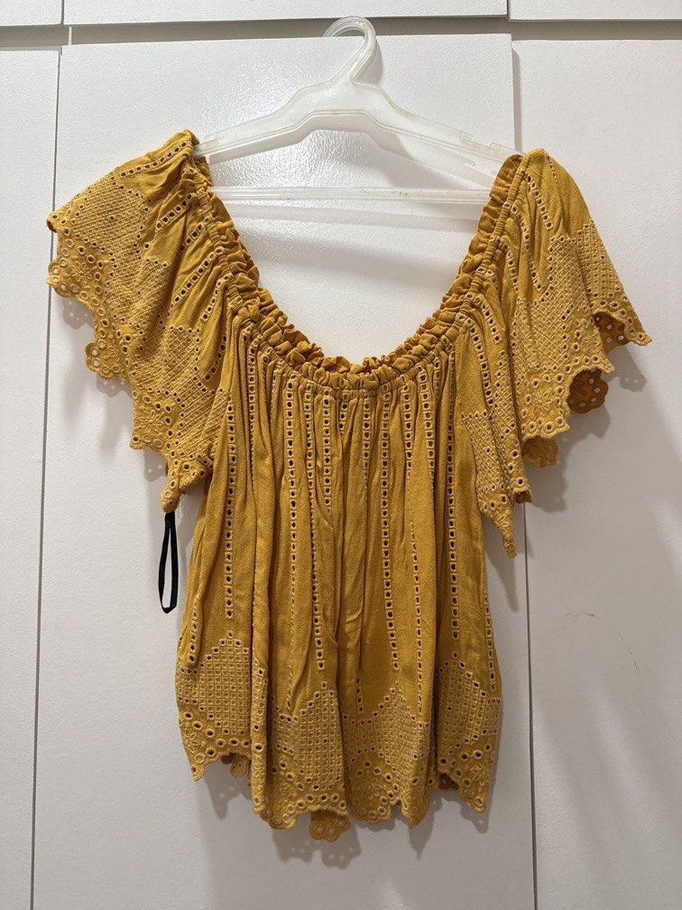 Yellow off shoulder top (Category: Blouses) located in Manila. Submitted by chipee (Listing ID 1438177829, Image 1). Description: Slightly used. .