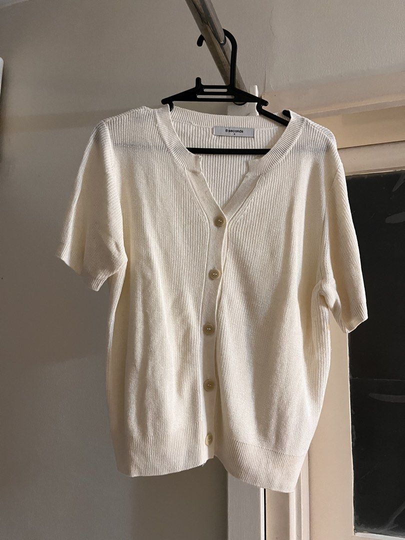 8 Seconds Short Sleeve Blouse/Cardigan (Category: Coats, Jackets and Outerwear) located in Taguig. Submitted by vanillastore_ (Listing ID 1438315625, Image 1). Description: - Cream-colored short sleeve blouse/cardigan - Brand: 8 Seconds - Size: S - Ribbed knit texture.