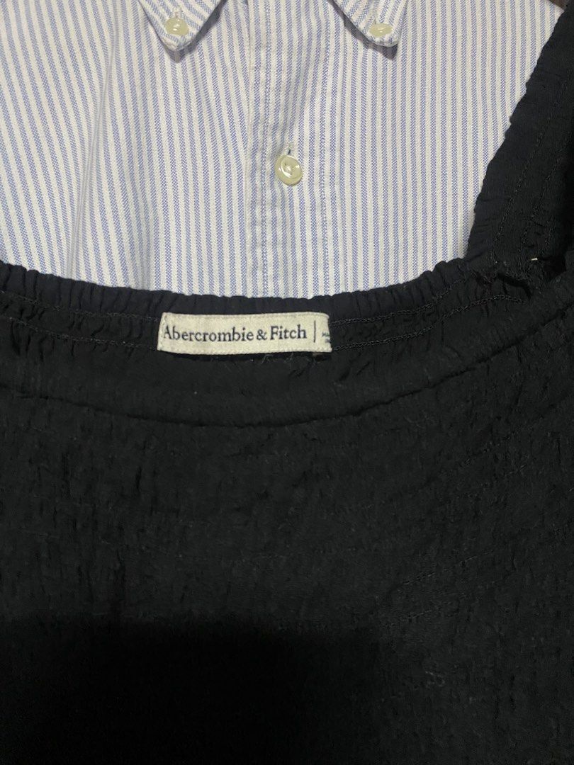 Abercrombie & Fitch Black Top (Category: Sleeveless) located in San Pedro. Submitted by raprap.monte (Listing ID 1438444850, Image 2). Description: - Abercrombie & Fitch black top - Features a square neckline - Long sleeves - Smocked bodice - Peplum hem - Can be dressed up or down.