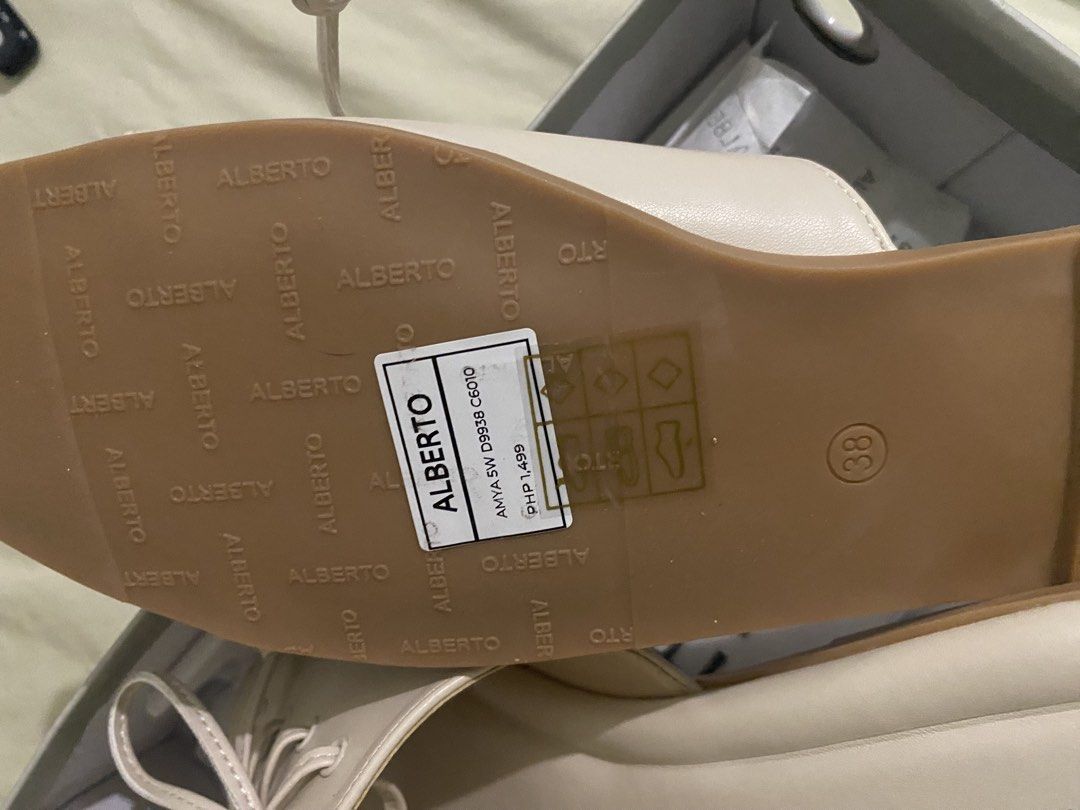 Alberto Lace-Up Sandals - Size 38 (Category: Flats & Sandals) located in Naga. Submitted by rembhert (Listing ID 1438331426, Image 3). Description: - Alberto sandals with lace-up design - Size 38 - Square toe - Neutral color - Alberto brand on sole - Comes with original box.