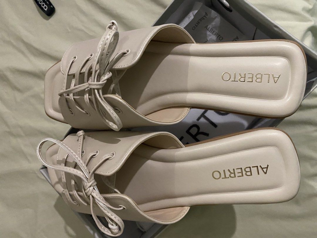 Alberto Lace-Up Sandals - Size 38 (Category: Flats & Sandals) located in Naga. Submitted by rembhert (Listing ID 1438331426, Image 2). Description: - Alberto sandals with lace-up design - Size 38 - Square toe - Neutral color - Alberto brand on sole - Comes with original box.