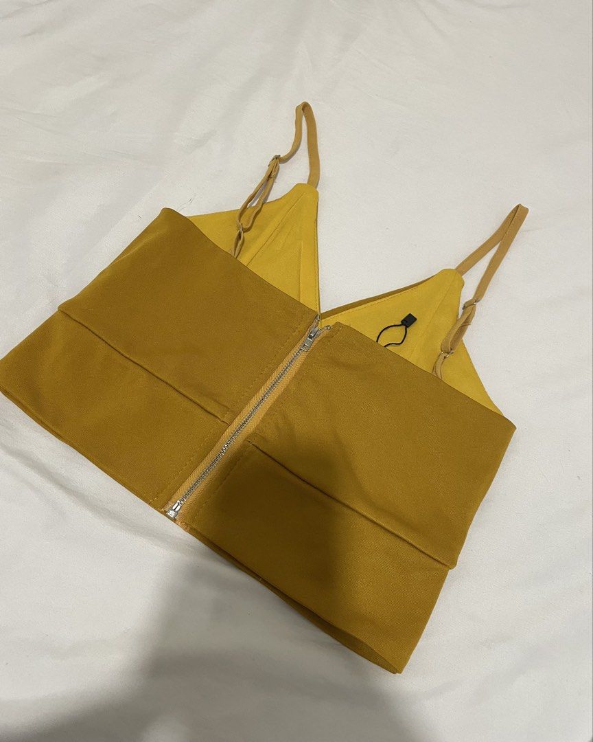 Amanda's Place Mustard Yellow Crop Top (Category: Sleeveless) located in Quezon City. Submitted by eryne (Listing ID 1438407604, Image 2). Description: - Mustard yellow crop top - Brand: Amanda's Place - Size: S - Adjustable straps - V-neck design - Zipper closure at the back - For petite girls only! -Never worn! - RFS: Decluterring .