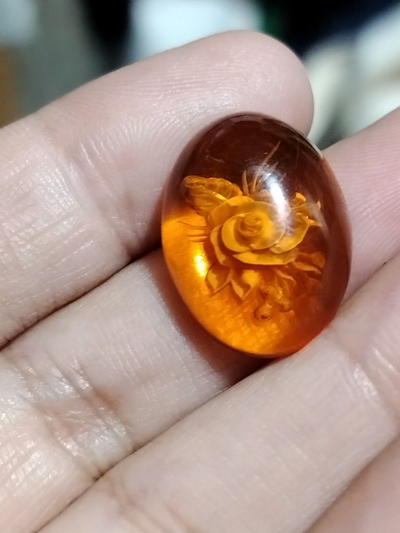 Amber Pendant with Rose Carving (Category: Necklaces) located in Tacloban City. Submitted by jsthrift002591 (Listing ID 1438494106, Image 2). Description: - Amber pendant with rose carving 20mm - Warm, orange-brown color - Smooth, polished surface - Intricately detailed rose carving - Unique and elegant jewelry piece.