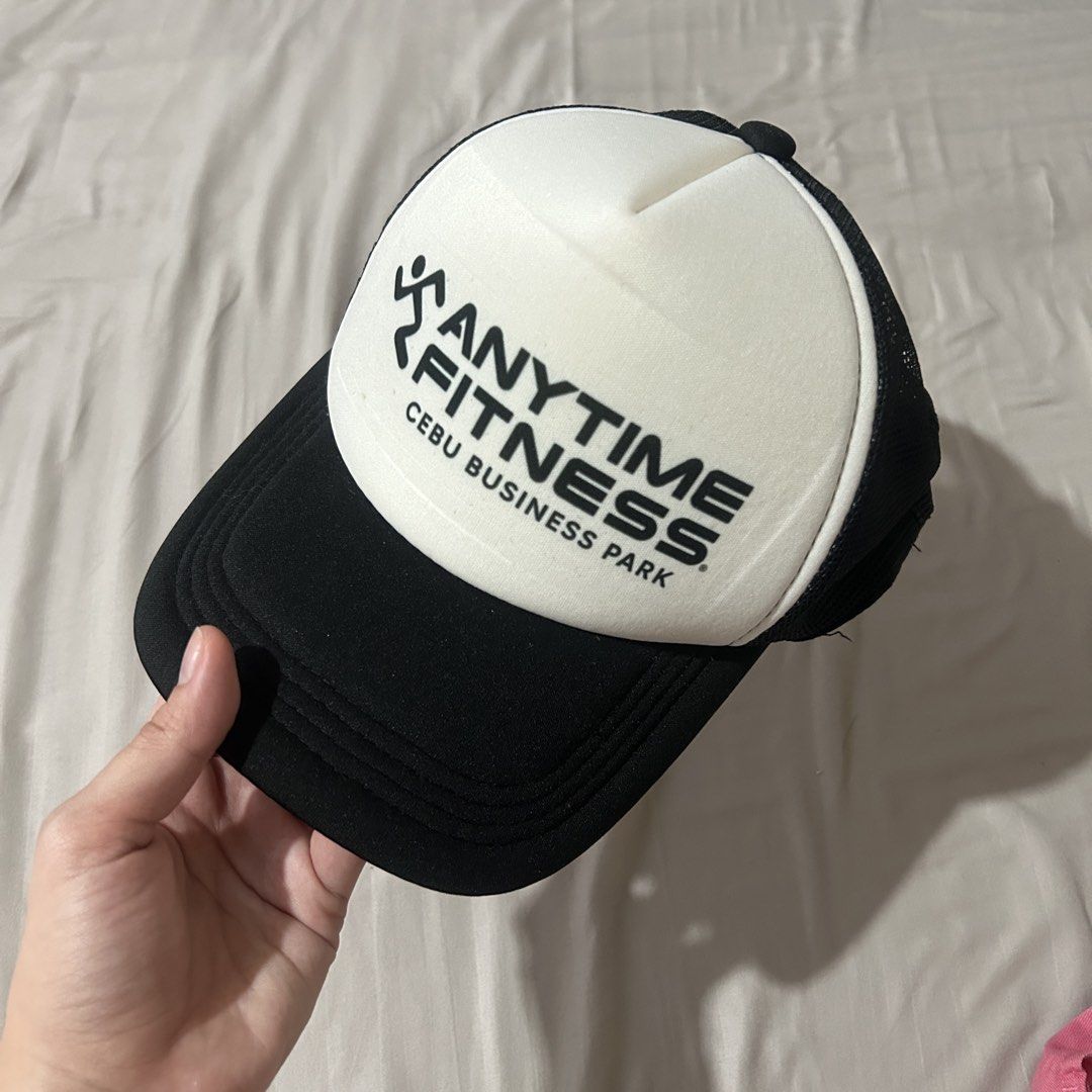 Anytime Fitness Trucker Cap (Category: Caps & Hats) located in Cebu City. Submitted by thiadeclutters (Listing ID 1438385306, Image 1). Description: - Anytime Fitness cap - Black brim and white front panel - Mesh back - Suitable for workouts and casual wear RFS: given as a freebie, never worn.