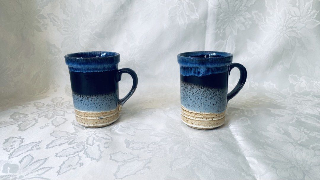 Ashdale Pottery Mugs (Category: Coffee & Tea Tableware) located in Quezon City. Submitted by smithram (Listing ID 1438322652, Image 1). Description: - Set of two Ashdale Pottery mugs - Unique blue and beige glaze - Marked "Ashdale Products Made in England" - Measurements shown in photos - Perfect for coffee or tea - Stylish kitchen addition.