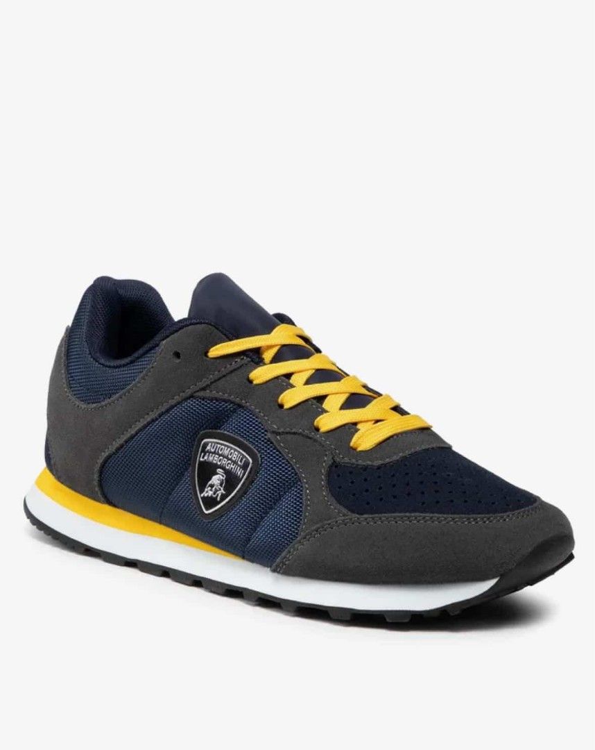 Automobili Lamborghini Sneakers (Category: Sneakers) located in Manila. Submitted by kiksfoekd (Listing ID 1438355182, Image 1). Description: - Automobili Lamborghini sneakers - Color scheme: Navy, grey, and yellow - Lamborghini logo on the side - Yellow laces - Black sole with white midsole - Combination of mesh and suede-like materials.