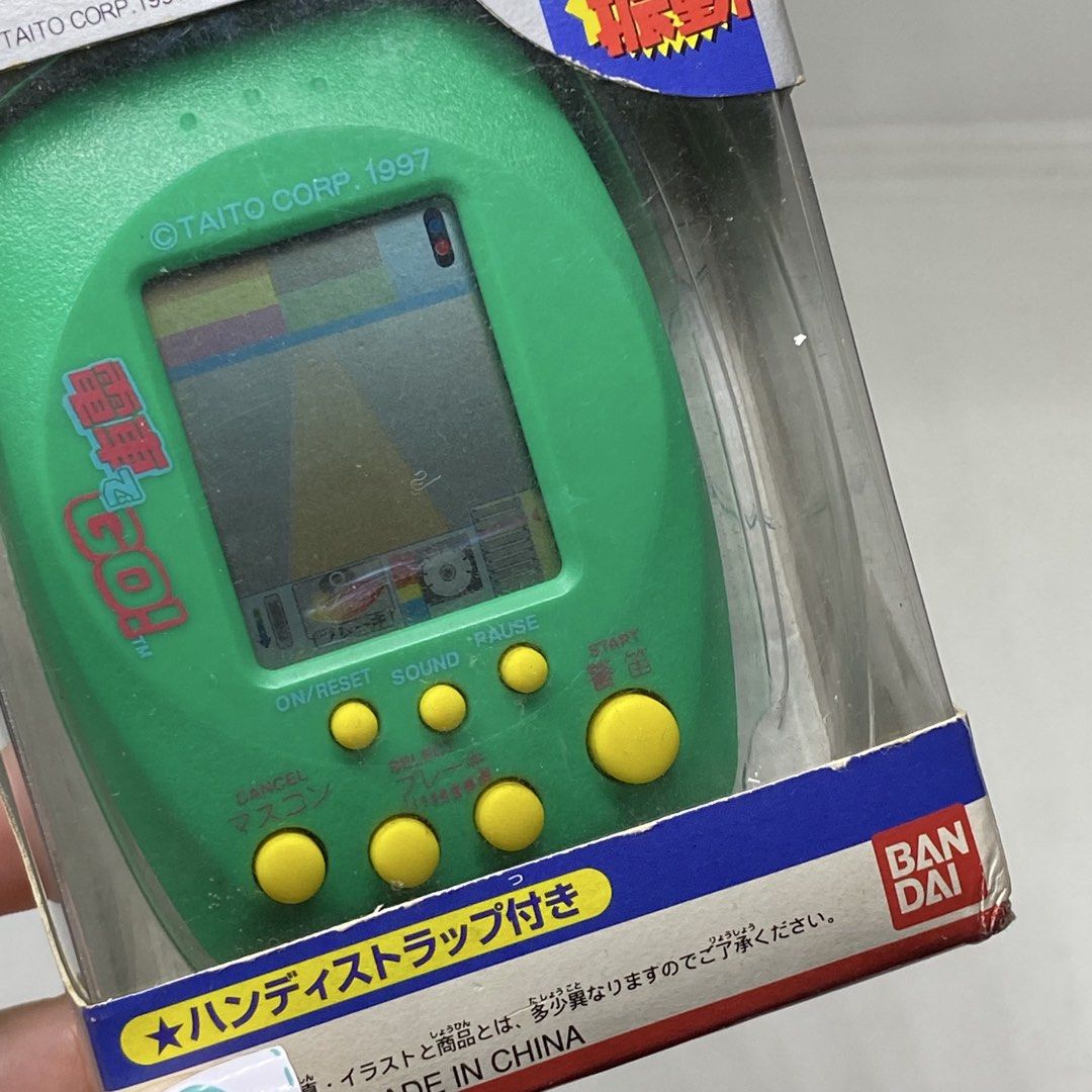 BANDAI PORTABLE VIDEO GAME CONSOLE - UNTESTED (Category: Nintendo) located in Quezon City. Submitted by kitsune.treasures (Listing ID 1438415357, Image 2). Description: *First to pay policy! *1 day reservation only. Failure to pay on time, auto cancel. 📍Quezon City * MOD: J&T | Lalamove * MOP: GCASH | BPI 📦ON HAND AND READY TO SHIP CONDITION: WHAT YOU SEE IS WHAT YOU GET. Dimensions: Kindly check the photos for the actual measurements. Please c