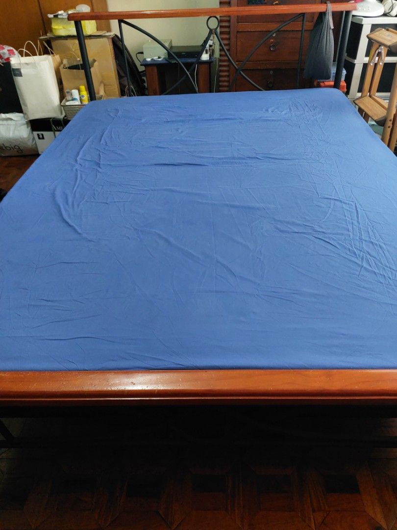 Bed frame metal with Queen size mattress (Category: Bed Frames & Mattresses) located in Makati City. Submitted by noel12 (Listing ID 1438308897, Image 2). Description: Decorative metal bed frame with wooden slot supports, very good condition Queen size bed mattress orthopedic type. If interested pls call or text 0917-8090821 (Noel)..