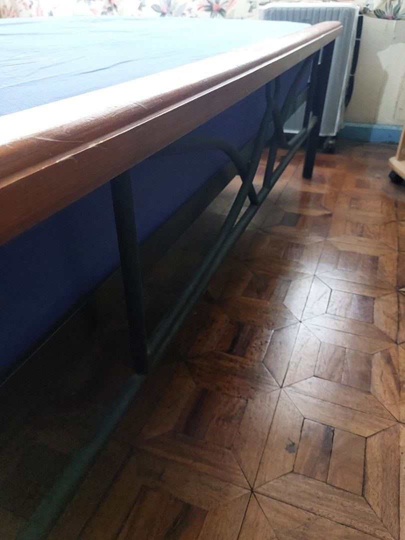 Bed frame metal with Queen size mattress (Category: Bed Frames & Mattresses) located in Makati City. Submitted by noel12 (Listing ID 1438308897, Image 3). Description: Decorative metal bed frame with wooden slot supports, very good condition Queen size bed mattress orthopedic type. If interested pls call or text 0917-8090821 (Noel)..